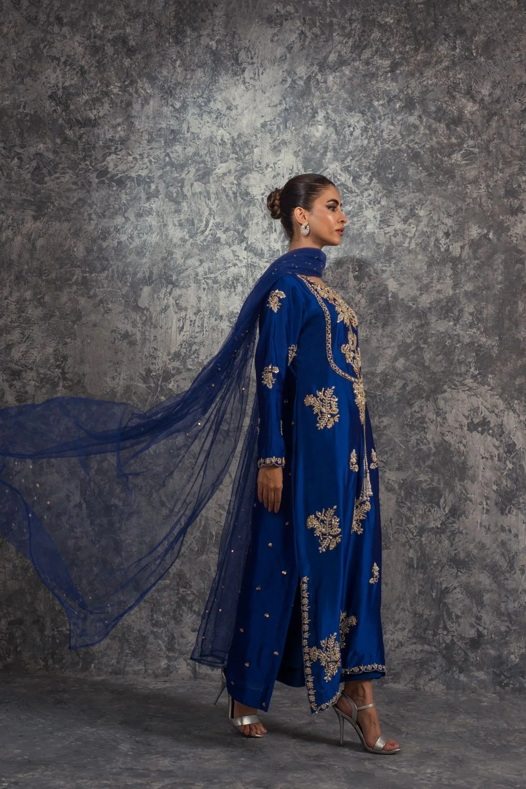 Royal Blue pakistani fashion outfit in gold, blue tones.